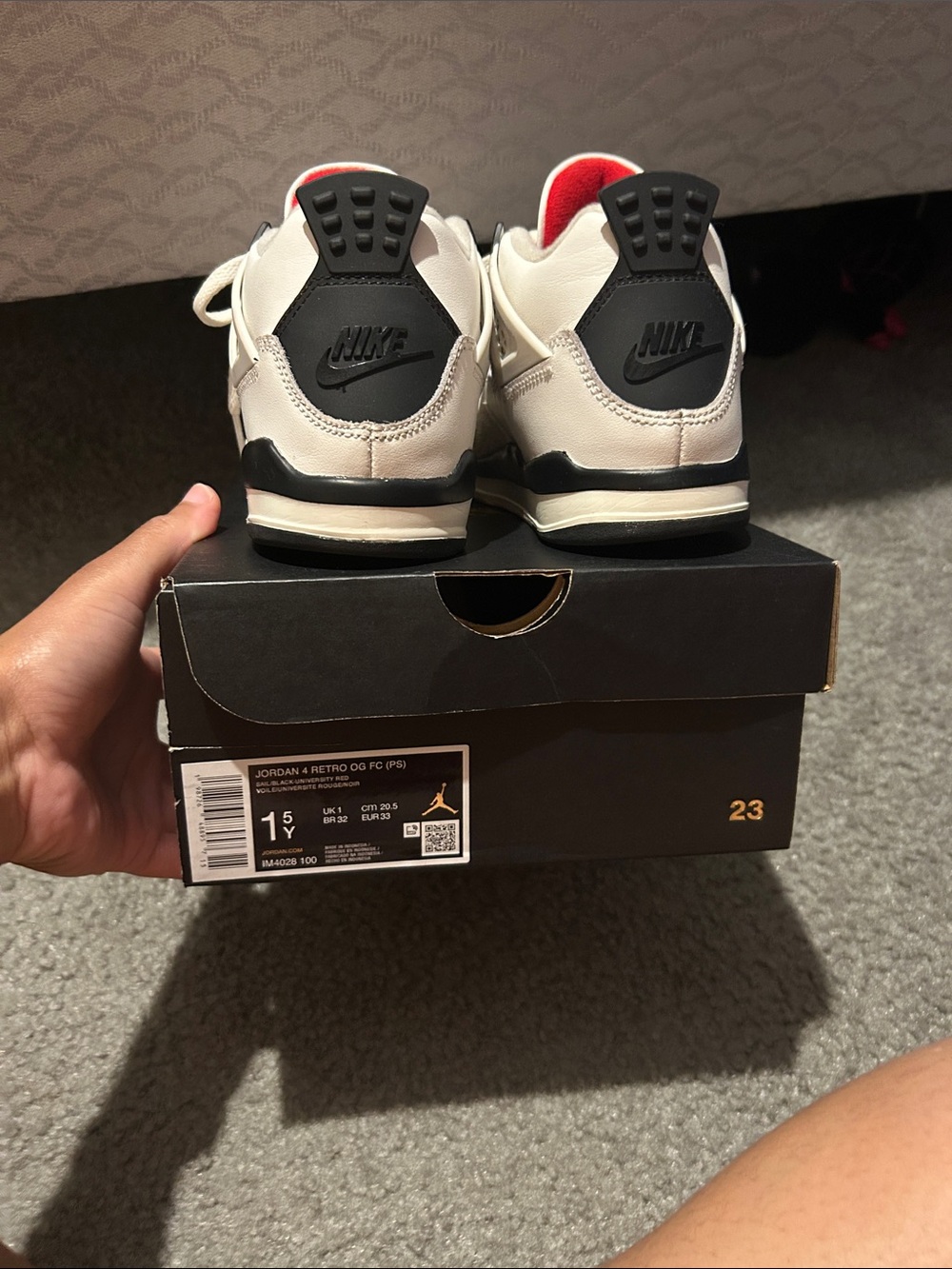 Nike Kids White Black and Red Jordan 4 Retro Sneakers